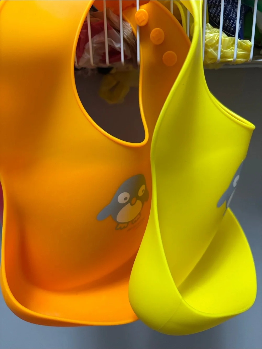 Bright Yellow & Orange Silicone Bibs with Penguin Design
